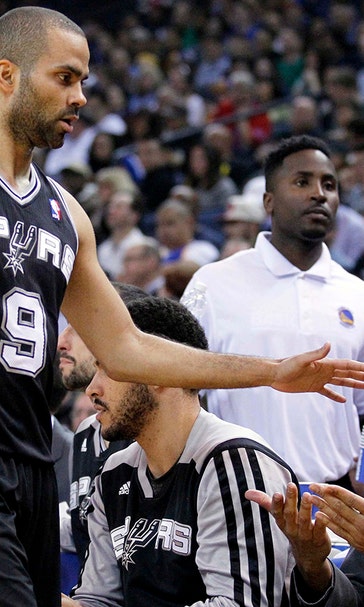 Short-handed Spurs outlast Warriors